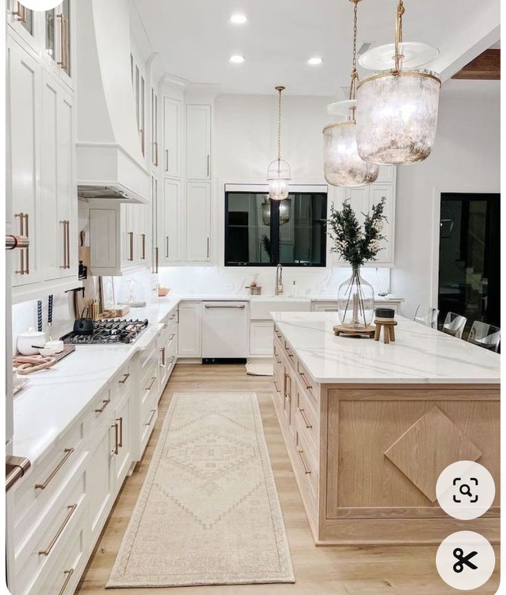 the kitchen is clean and ready to be used for cooking or baking, with an area rug on the floor