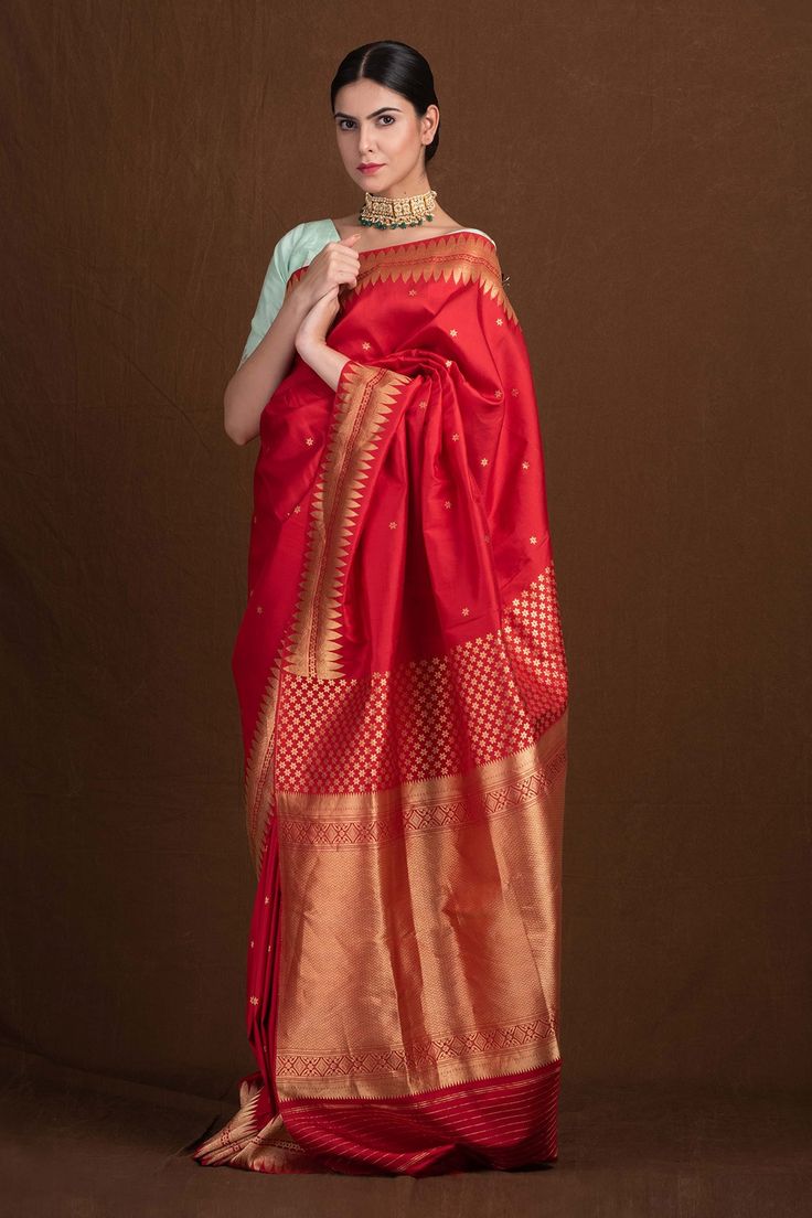 Red banarasi saree with floral woven pattern and geometric border.
Component: 1
Pattern: Handwoven
Type Of Work: Floral
Fabric: Pure Katan Silk
Color: Red
Other Details: 
Weight (in gms) approx. : 900
Note: Blouse worn by the model is not for sale
Occasion: Wedding - Aza Fashions Red Banarasi Saree, Geometric Border, Katan Silk, Banarasi Saree, Woven Pattern, Blouse For Women, Fashion App, Wedding Time, Banarasi Sarees