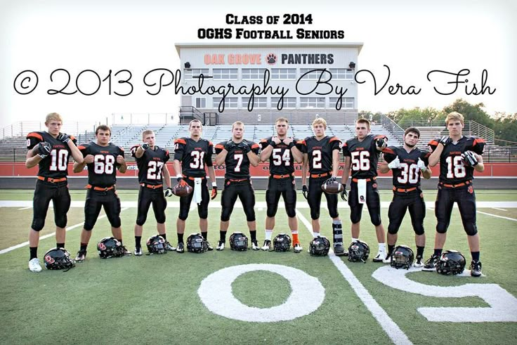 the football team is posing for a photo on the field