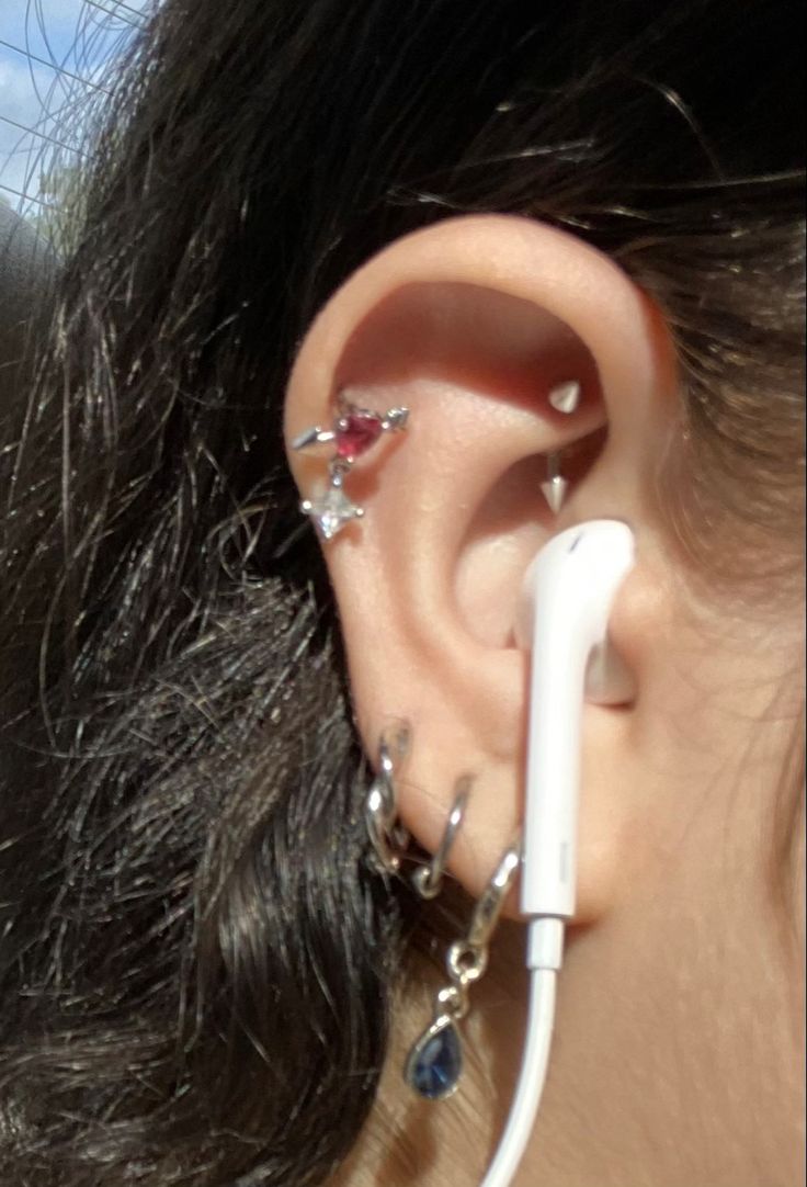 a woman with ear piercings on her ears