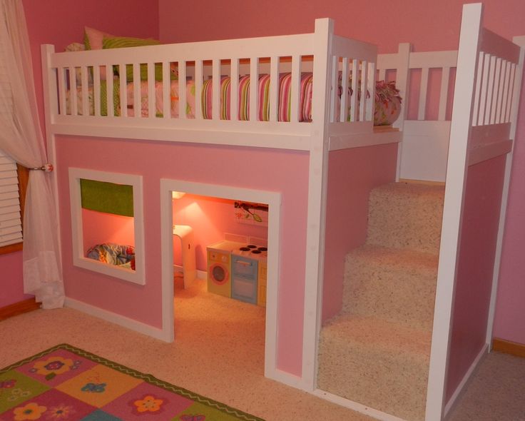 a child's bedroom with pink walls and white bunk beds, carpeted floor