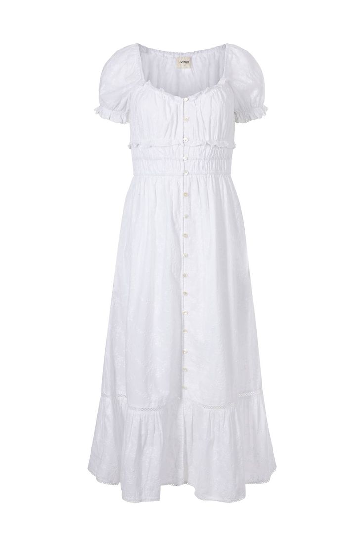 Our most epic romantic dress is here. The Mary dress is a delicate white long dress in a dreamy cotton textile. It features a round neckline, gathered bust and petite ruffles. Its stretchy smocked bodice finishes with a delicate crochet trimming, and gives way to a full-length skirt with in a big ruffle at the bottom. 100% cotton Maxi length BSCI certified. Made in India. Midi-length Prairie Dress With Ruffles For Daywear, Midi Length Prairie Dress With Ruffles For Daywear, Ruffled Midi Prairie Dress For Daywear, Feminine Smocked Dress With Gathered Neckline For Daywear, Feminine Smocked Dress With Gathered Neckline, Daywear Smocked Dress With Gathered Neckline, Daywear Smocked Dress With Ruched Ruffled Straps, Ruched Smocked Dress With Ruffled Straps For Daywear, Daywear Prairie Dress With Ruffled Fitted Bodice