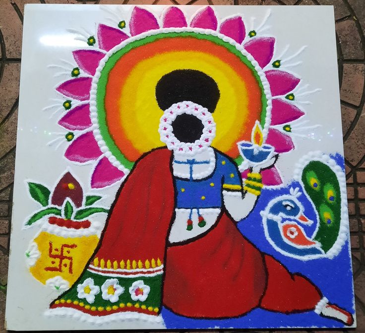 a painting on the ground with flowers and a woman holding a cup in her hand