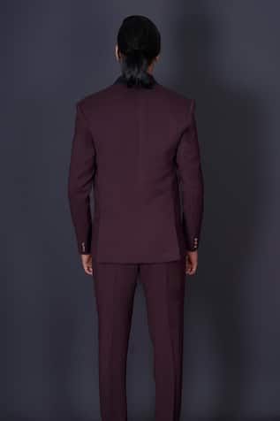 Maroon tuxedo blazer featuring kardana beads hand embroidered work behind a contrasting black lapel. Comes with a vest, black shirt, pant and a bow-tie. - Aza Fashions Festive Elegant Workwear Suits, Tailored Bandhgala With Notch Lapel For Semi-formal Occasions, Fitted Blazer With Suit Collar For Festive Season, Notch Lapel Blazer For Business And Festive Occasions, Festive Fitted Blazer With Suit Collar, Tailored Notch Lapel Sets For Party, Semi-formal Party Wear Blazer With Long Sleeves, Fitted Unstitched Suit For Workwear With Long Sleeves, Fitted Unstitched Suit For Semi-formal Party