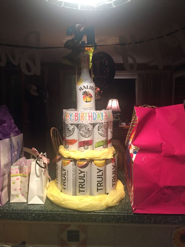 a birthday cake made to look like a banana sitting on top of a counter in a kitchen