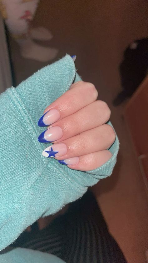 Cute Acrylic Nails Stars, French Tip Nail With Star, Spring Nails Stars, Nails Acrylic Almond Stars, Grad Nails Acrylic Almond, Acrylic Nails French Tip Designs, Blue With Stars Nails, Blue French Tip Nails With Stars, Blue Concert Nails