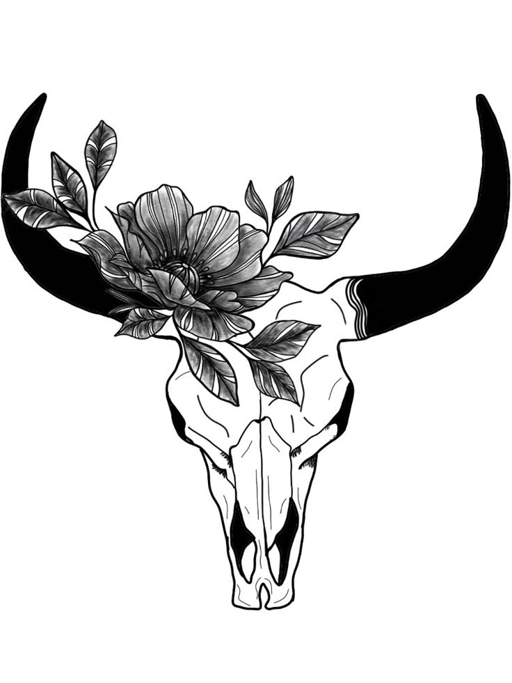 a bull skull with flowers on it's head