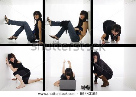 a woman sitting on the floor with her legs crossed and holding a laptop in front of her