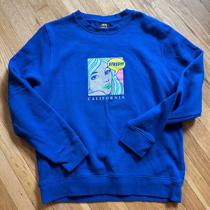 Bright Blue Pop Art Stussy Crewneck Sweatshirt, Never Worn! Blue Screen Print Sweatshirt For Streetwear, Blue Cotton Sweater With Graphic Print, Trendy Blue Graphic Print Sweatshirt, Trendy Blue Sweatshirt With Graphic Print, Blue Long Sleeve Sweatshirt With Graphic Print, Blue Graphic Print Sweater For Streetwear, Casual Blue Sweater With Graphic Print, Blue Trendy Relaxed Fit Sweatshirt, Blue Casual Sweatshirt With Screen Print