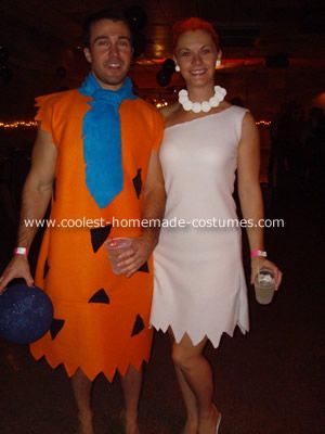 a man and woman dressed up in costumes