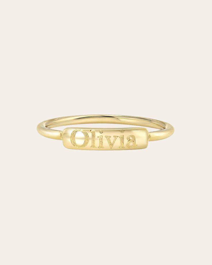 Beautifully handcrafted 14k solid gold nameplate ring engraved in block font. Uber chic and timeless, wear it solo or stacked, this custom ring is a must have. Available in 14k yellow, white, and rose gold. NOTE: Please enter up to 6 letters in the engraving box. Size of Bar: Approx. 11mm(W) by 3mm(H) 14k Solid Gold Standard Production: 7-12 business days Rush Order Production: 5-8 business days Shipping: Select shipping method at checkout. Shipped from our L.A. Studio. This item is Final Sale. Classic Yellow Gold Engraved Ring With Custom Name, Personalized Nameplate Promise Ring, Everyday Yellow Gold Engraved Ring, Yellow Gold Engraved Nameplate Ring As Gift, 14k Gold Engraved Ring With Custom Name For Promise, 14k Gold Custom Name Engraved Ring For Promise, Elegant 14k Gold Nameplate Engraved Ring, Custom Name Engraved 14k Gold Promise Ring, Custom Name 14k Gold Engraved Promise Ring