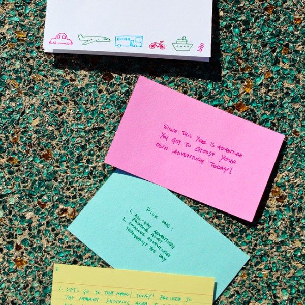 three post it notes sitting on the ground