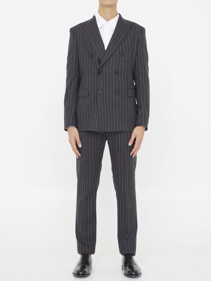 Two-piece suit in grey pinstripe virgin wool. Jacket with classic lapels, double-breasted closure, two front flap pockets, a welt pocket on chest and buttoned cuffs. Trousers with zip, button and hook-and-eye closure, two side welt pockets, two rear welt pockets and belt loops. Regular fit. The model is 184cm tall and wears size IT 50.Size nationality: IT Product number: 32845996 Product code: 01AI3ROY7460R901 Composition: 98% virgin wool, 2% elastane Classic Pinstripe Blazer With Double-breasted Button, Classic Pinstripe Double-breasted Blazer, Pinstripe Blazer With Notch Lapel And Double-breasted Buttons, Pinstripe Notch Lapel Blazer With Double-breasted Button, Pinstripe Double-breasted Blazer With Notch Lapel, Tailored Pinstripe Suits With Double-breasted Button Fastening, Classic Pinstripe Suit With Double-breasted Button Fastening, Classic Pinstripe Suit With Double-breasted Button, Formal Striped Blazer With Double-breasted Button