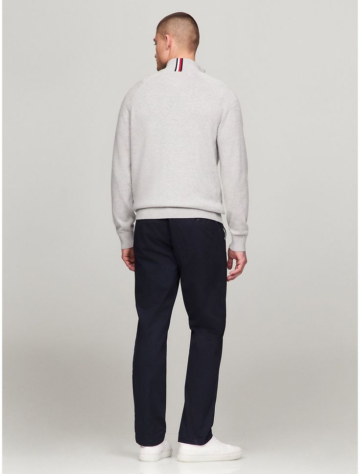 Tommy Hilfiger men's sweater. Made from soft cotton and styled in an easy fit, our sweaters are soft, comfortable layers.  Material: 100% Cotton. Classic Half-zip Sweater With Ribbed Collar, Classic Half-zip Sweater With Ribbed Cuffs, Classic Turtleneck Sweatshirt With Ribbed Collar, Classic Polo Sweater With Half-zip And Ribbed Collar, Classic Half-zip Polo Sweater With Ribbed Collar, Half-zip Polo Sweater With Ribbed Cuffs For Winter, Casual Polo Sweater With Ribbed Cuffs For Business Casual, Classic Half-zip Polo Sweater With Ribbed Cuffs, Tommy Hilfiger Winter Sweatshirt With Ribbed Cuffs