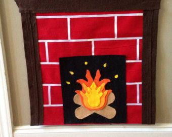 a red brick fireplace with a dog paw on it's side and flames coming out of the fire