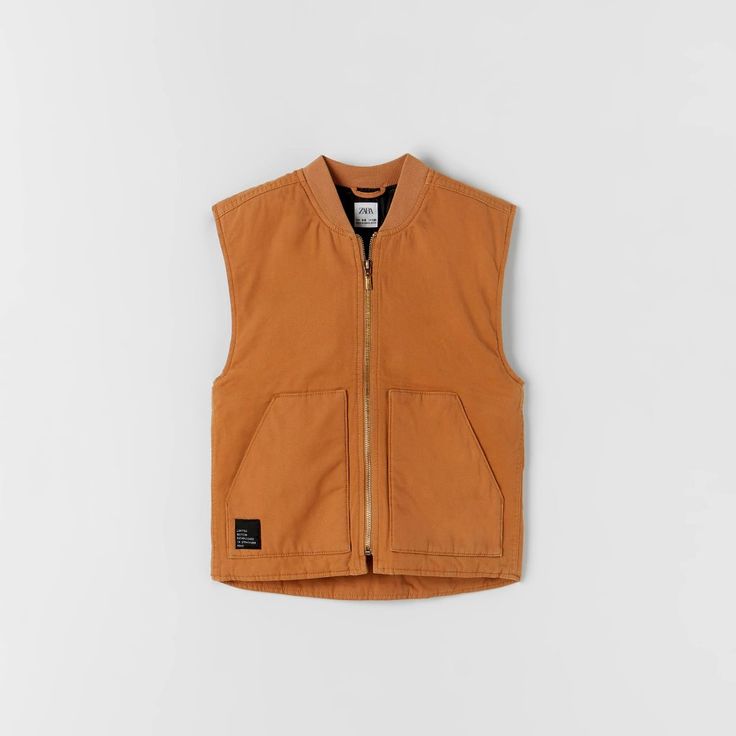 Zara Worker Waistcoat Sleeveless - Two Front Pockets Front Zip Closure New With Tags - Unique Piece Size 9-10 Years (140 Cm) Style 6987/730 Material 100% Polyester Winter Utility Sleeveless Vest, Utility Sleeveless Vest For Winter, Sleeveless Utility Vest For Winter, Casual Sleeveless School Vest, Brown Streetwear Vest With Pockets, Fall Streetwear Solid Color Vest, Solid Color Fall Streetwear Vest, Fall Streetwear Vest, Zara Vest With Pockets For Fall