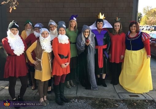 a group of people dressed up in costumes