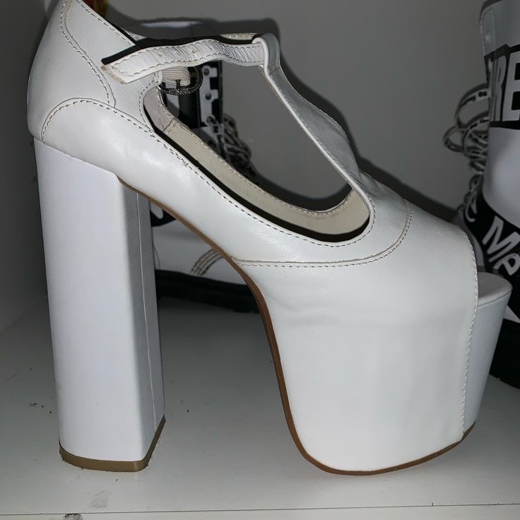 Pretty Much Brand New. No Damage. White Patent Leather Heels With 4-inch Heel, White Chunky Platform Wedge Heels, White Chunky Platform Heels With Ankle Strap, White Platform Heels In Trendy Style, White Chunky Platform Heels With Round Toe, White Heels With Chunky Platform And Round Toe, Modern White Open Toe Heels, White Patent Leather Block Heels, White Leather Heels With Ankle Strap