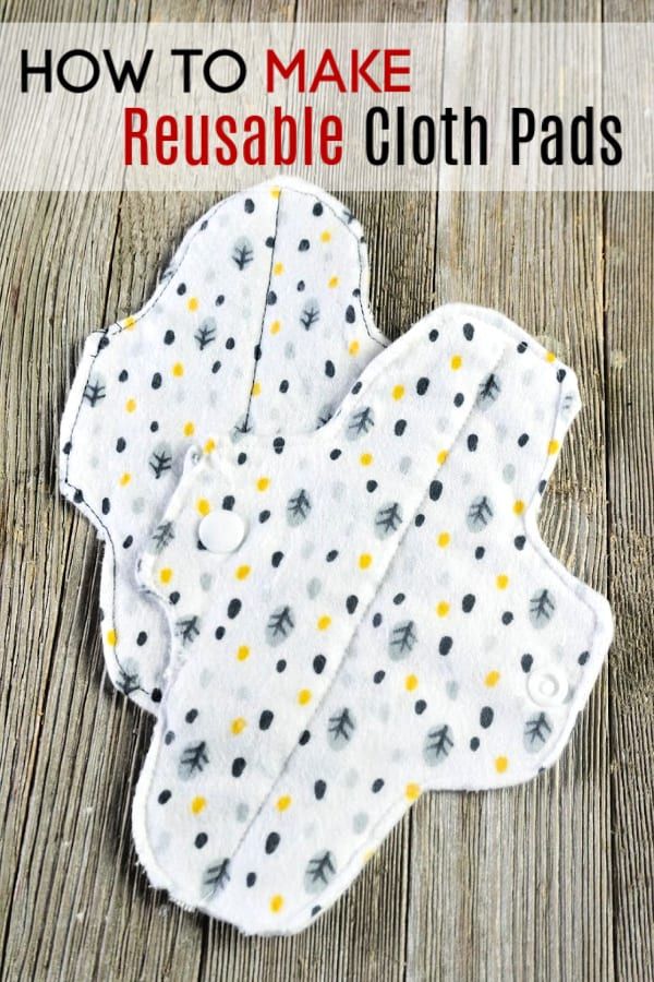 three reusable cloth pads sitting on top of a wooden table with text overlay that says how to make reusable cloth pads