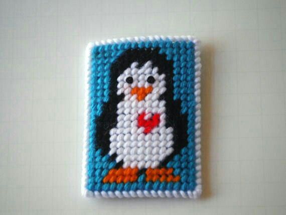 a small square with a penguin on it