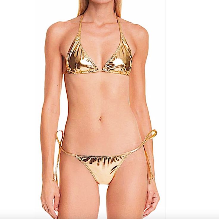 Size Info True To Size. Details & Care Done In Flashy Nylon With A Touch Of Stretch, This Two-Piece Swimsuit Features A Classic Triangle Top Paired With Side-Tie Bottoms In A Liquid-Gold Hue. Est. Retail Price: $300.00 Ties At Neck And Back Side Ties 72% Nylon, 28% Elastane Hand Wash, Dry Flat Made In The Usa Of Imported Fabric Metallic Swimwear For Vacation During Beach Season, Metallic Beachwear Swimwear For The Pool, Metallic Swimwear For Poolside Summer, Metallic Beachwear Swimwear For Pool, Metallic Summer Swimwear For Poolside, Metallic Swimwear For Poolside In Summer, Metallic Poolside Swimwear For Summer, Metallic Triangle Top Swimwear For The Pool, Metallic Beachwear Swimwear For Summer