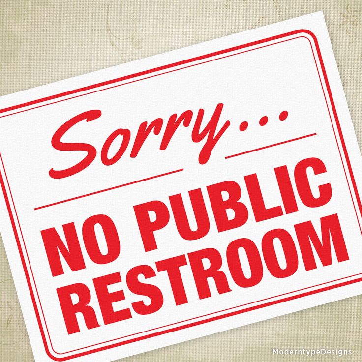 a red and white sign that says sorry no public restroom