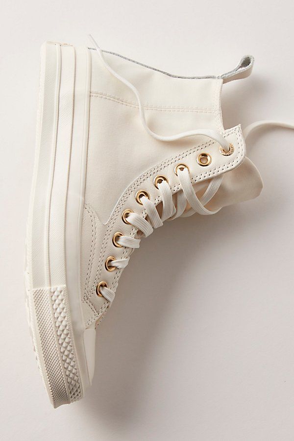 Sleek seams define these high-top sneakers from Converse, featured in a monochrome design for an elevated look. **Features:** High-top style, canvas uppers, exposed seams, rubber toe cap, heel tab, rubber sole, lace-up closure **Why We | Chuck 70 Tailored Lines Sneakers by Converse at Free People in White, Size: US 5.5 M Wedding Reception Sneakers, High Top Sneaker Outfits Women, Chucks Wedding, Bride Converse, Thrift Ideas, Reception Shoes, Wedding October, White Chucks, High Top Chucks