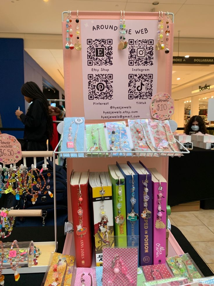 there are many books on display in the store and one is for sale with qr code