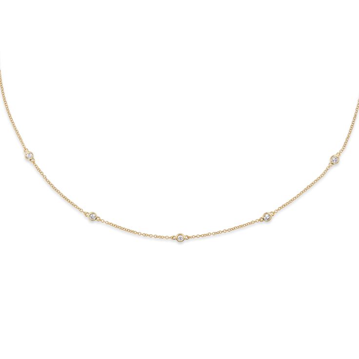 This beautiful, simple necklace, often referred to as a style called Diamonds by the Yard, features diamonds set into bezels along the necklace chain. Its shorter length sits just above the collar bone, begging to be seen. 14k yellow gold Five 2mm diamonds 15 inch length Please allow 4-6 weeks for production, as this piece is made to order just for you Luxury Minimalist Single Strand Diamond Necklace, Single Line Diamond Necklace, Luxury Minimalist Diamond Necklace With Delicate Chain, Refined Diamond Necklace With Accents, 3mm Diamond 17inch Linear Diamond Necklace, Collar Bone, Simple Necklace, Vintage Collection, Bones