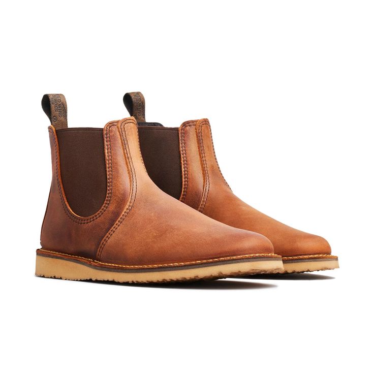 Off-the-clock style meets the work-hardened bones of Red Wing in the Weekender Chelsea boot. The Weekender Chelsea uses stitchdown construction with no shank and a polyurethane sole for a lightweight, flexible, slip-on-and-go boot. A multi-piece upper in Red Wing's famous Rough & Tough pull up leather gives dimensionality with a dark base color and lighter overtones that only get richer with age. Red Wing Shoes Men's, Red Wing Heritage Boots, Wing Shoes, Red Wing Shoes, Heritage Fashion, Red Wing, Leather Conditioner, Leather Cleaning, Colored Leather