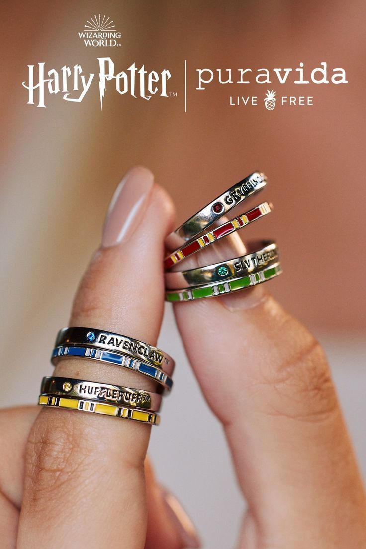 harry potter rings are stacked on top of each other in different styles and colors, with the words live free written across them