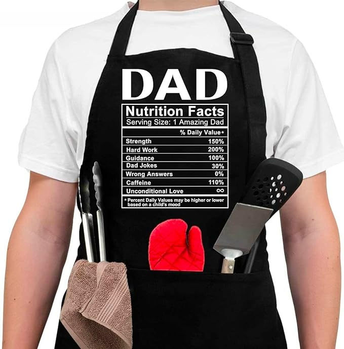 a man wearing an apron with the words dad written on it and cooking utensils in his pocket