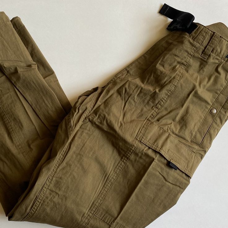 100% Authentic Mens The North Face Ripstop Cargo Easy Pants (Msrp $99). These Pants Are Brand New With Tags! Style: A5j4h Color: Military Olive Size Available: 32, 34 Or 38 Regular Inseam 32" Relaxed Fit Elasticated Waistband With An Integrated, Partially Exposed Belt With A Branded Thermoplastic Buckle For Adjustability Zip-Fly With A Snap Closure Snap-Closure Welt Hand Pockets Two Cargo Pockets On Thighs With A Hook-And-Loop Flap Closure Snap-Closure Welt Back Pocket Adjustable Cuffs With A Dr Khaki Pants With Hip Pockets For Outdoor, Utility Work Pants For Outdoor With Belt Loops, Outdoor Techwear Cargo Style Work Pants, Techwear Cargo Pants With Belt Loops For Hiking, Utility Work Pants With Multiple Pockets For Outdoor, Techwear Cargo Style Work Pants For Outdoor, Utility Work Pants With Pockets For Outdoor, Utility Work Pants With Pockets For Outdoor Activities, Techwear Tapered Leg Pants For Outdoor