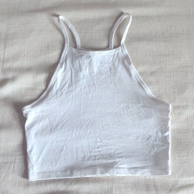 Size S Never Worn Jersey Material Simple Fitted White Crop Top, Simple Fitted Crop Top For Summer, White Cotton Halter Top Casual Style, Simple White Crop Top For Summer, White Racerback Crop Top For Summer, Basic H&m Tops For Summer, H&m Basic Summer Tops, Sporty H&m Tops For Spring, Basic H&m Summer Tops