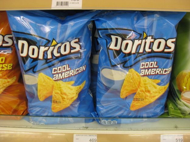 two bags of doritos are on the shelf