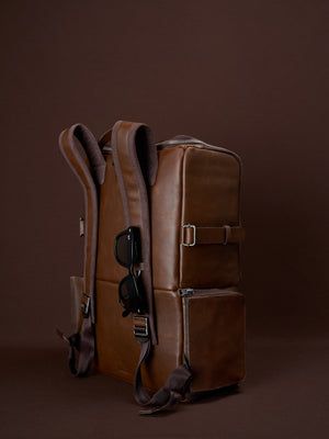 Modern Bags With Detachable Strap For Trip, Travel Backpack With Detachable Strap, Detachable Strap Backpack For Trips, Leather Backpack With Detachable Strap For Travel, Brown Everyday Carry Backpack With Adjustable Strap, Standard Backpack With Detachable Strap For Trip, Rectangular Backpack With Luggage Sleeve For Everyday, Rectangular Travel Bags With Adjustable Straps, Leather Bag With Adjustable Straps For Daily Use