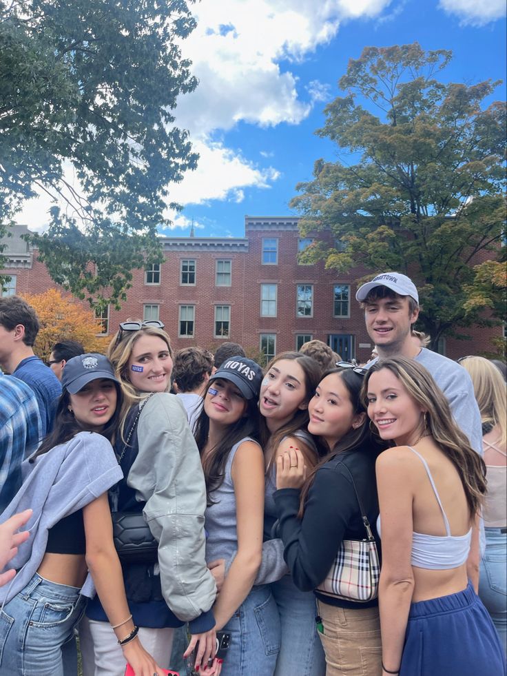 a group of young people standing next to each other