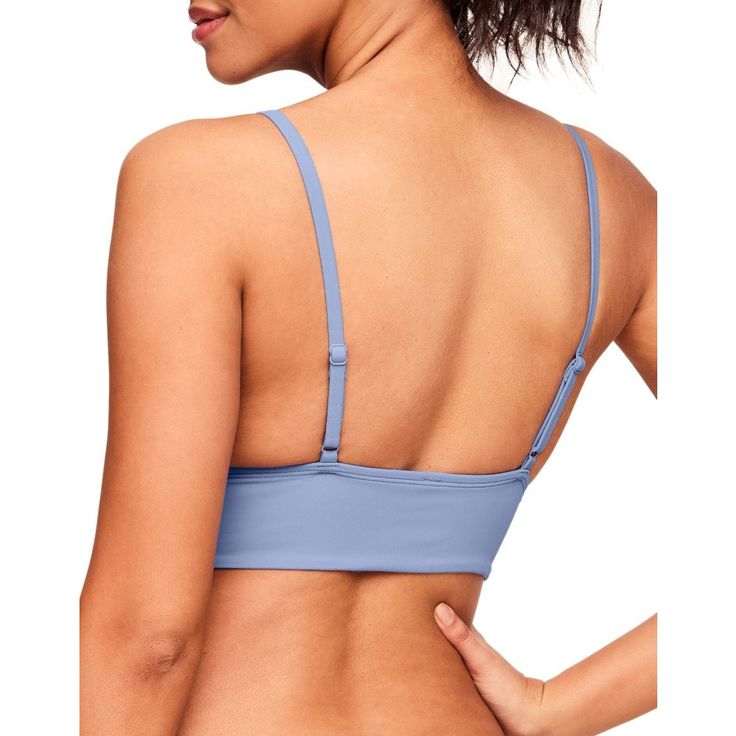 Crafted from high-quality materials, this swim bra is both lightweight and durable, ensuring it will last through countless swims and outings. The soft and stretchy fabric is designed to provide maximum comfort and support, while the adjustable straps ensure a perfect fit. Solid Swimwear With Built-in Bra, Compressive Swimwear With Built-in Bra For Beach, Workout Swimwear With Built-in Bra, Beach Bra With Adjustable Straps And Stretch, Micro-elastic Underwire Bra With Seamless Construction, Compressive Athleisure Swimwear With Built-in Bra, Supportive Full Coverage Swimwear With Built-in Bra, Stretch Bra With Built-in Support For Poolside, Swimming Push-up Bra With Built-in Support