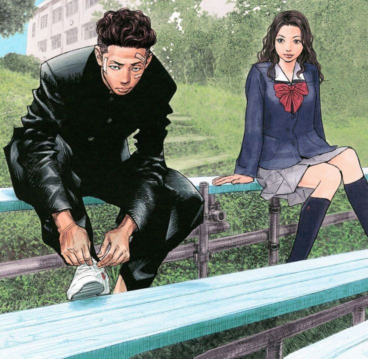 an image of a man and woman sitting on a bench