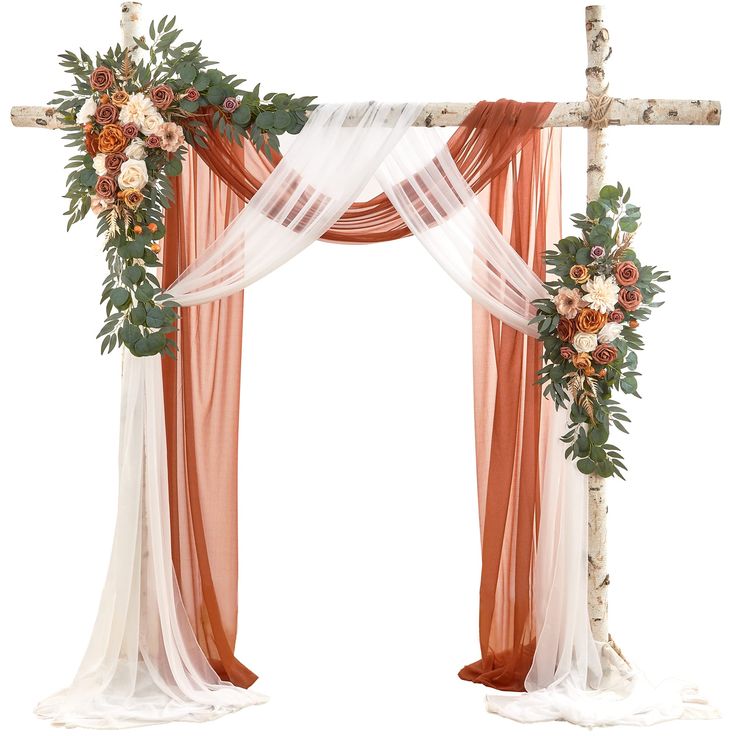 an orange and white wedding arch decorated with flowers, greenery and sheer drapes