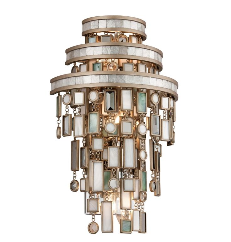 an art deco chandelier with white and gold accents