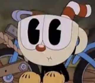 an animated cat with big eyes sitting in front of a pile of junk and other items