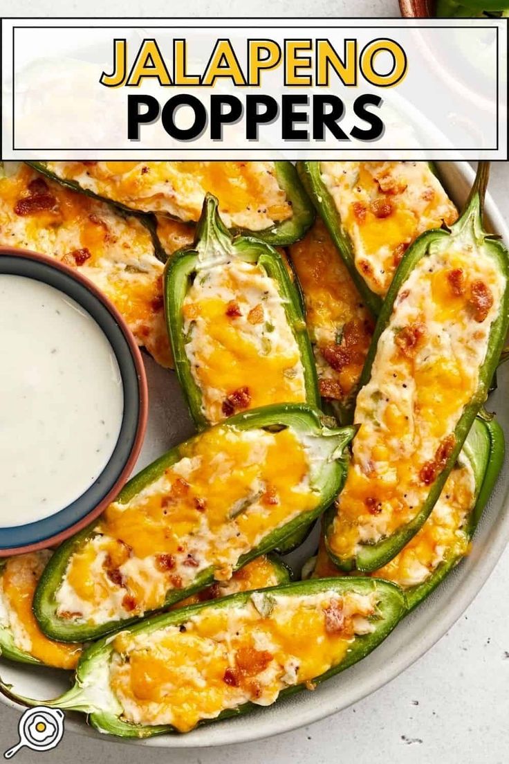 jalapeno poppers on a plate with ranch dressing