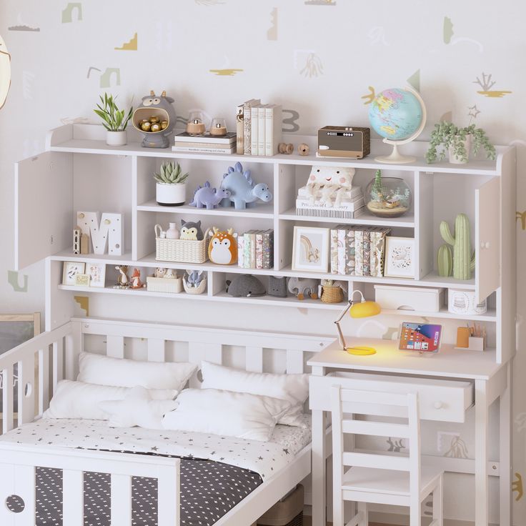 a white bed sitting next to a book shelf filled with books