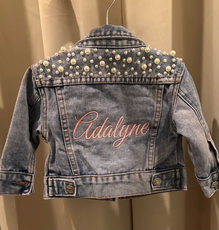 P E R S O N A L I Z E D ✶ J A C K E T This blue pearl custom denim kid jacket is the perfect gift for a the most stylish litter girls! A show stopper to wear to any & all of your special events- baby girl's party, flower girl for a wedding, or just because! This jacket can be customized to say anything you want. Please note the name/word/phrase desired when placing order. Feel free to contact us for any further customization. Please read all information down below thoroughly as we do not accept Customizable Blue Denim Jacket, Cute Medium Wash Denim Jacket, Customizable Denim Jacket For Spring, Spring Customizable Denim Jacket, Customizable Cute Denim Jacket, Customizable Long Sleeve Denim Jacket, Customizable Denim Jacket, Cute Fitted Blue Denim Jacket, Fitted Long Sleeve Cute Denim Jacket