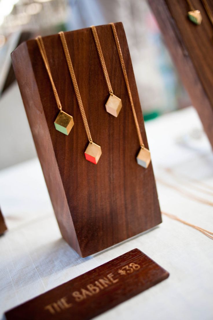 the necklaces are on display at the table for everyone to see them in their own store