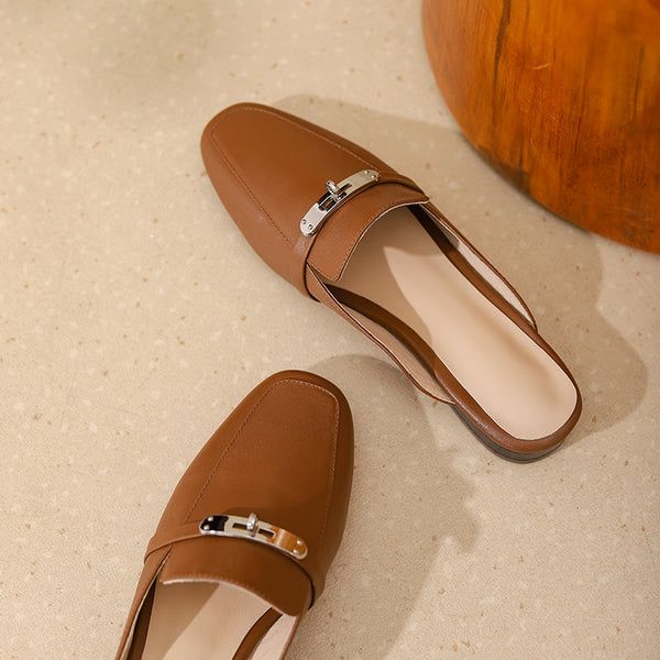 Trendy Formal Flat Slip-ons, Brown Pointed Toe Slip-ons For Office, Trendy Closed Toe Slip-ons For Work, Trendy Brown Slip-on Mules, Brown Pointed Toe Slip-ons For Spring, Spring Office Slip-on Mules, Brown Summer Loafers With Flat Heel, Trendy Flat Heel Slip-ons For Work, Brown Flat Loafers For Summer