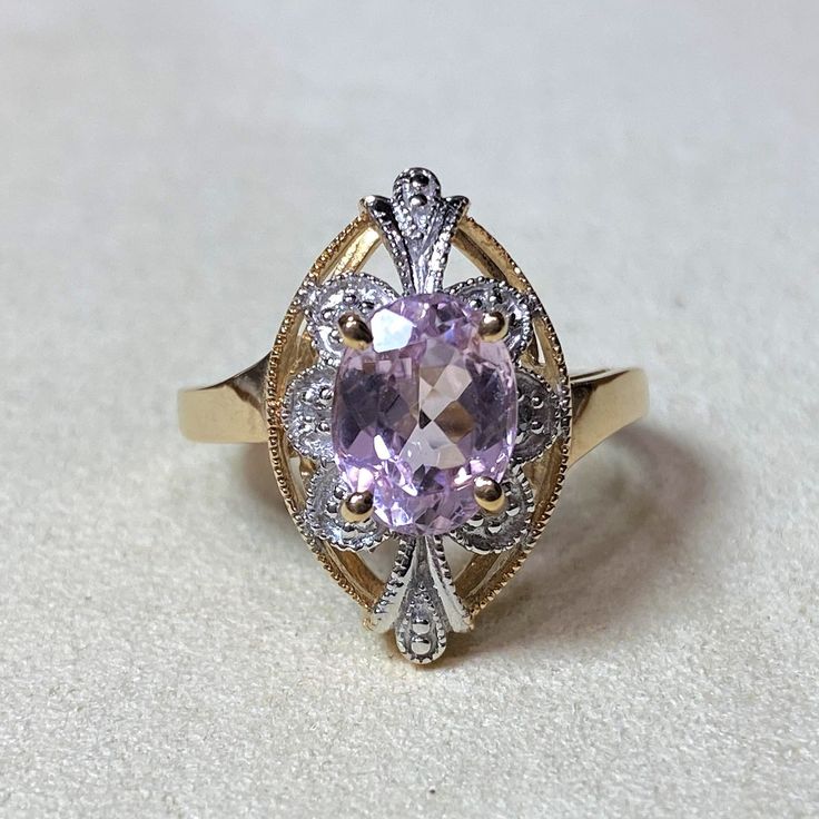 Vintage 14k Yellow, White Gold Pink Oval Kunzite Diamond Ring ...Marked 14K....Total of weights 4.1grams...Size 6.5...Measure of stone center 9 x 7MM 1.86ct. Measure of Face 19.8MM...It's in very good condition. Classic Oval Amethyst Ring With Accent Stones, Classic Oval Amethyst Ring With Diamond, Oval Amethyst Ring With Center Stone In Gold, Oval Gold Amethyst Ring With Center Stone, Heirloom Oval Amethyst Ring With Accent Stones, Oval Diamond Ring For Collectible, Oval Diamond Ring For Collectors, Gold Oval Amethyst Ring With Accent Stones, Oval Amethyst Ring With Accent Stones