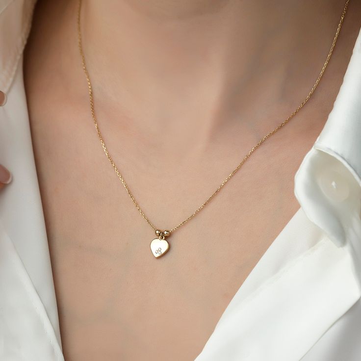 Tria Mini Heart Necklace, 14k Gold Necklace, Gold Necklaces, Gift Necklace, Necklace for Women Gift, Necklace for Mom ITEM DETAILS ❆ All our jewelleries are handmade with Love and Care 💓 ❆ Material: 14K Gold. ❆ Gram: 1,74 gr ❆ Each item is made to order. Since all of our products are handmade, there may be -) 10% deviation in the specified weight. ❆ DO YOU LIKE THIS RING? You can get more information about it below but if you have any questions, just send a message. PACKAGING ❆ They are sent in Classic Heart-shaped Birthstone Necklace, Classic Heart Pendant Necklace With Birthstone, 14k Gold Heart Necklace Tarnish Resistant For Gift, 14k Gold Tarnish-resistant Heart Necklace Gift, Yellow Gold Heart Cut Charm Necklaces With Delicate Chain, Yellow Gold Delicate Chain Heart Cut Charm Necklaces, 14k Gold Heart Pendant Necklace For Gift, Yellow Gold Heart Cut Charm Necklace With Delicate Chain, 14k Gold Heart Necklace With Delicate Chain For Gift