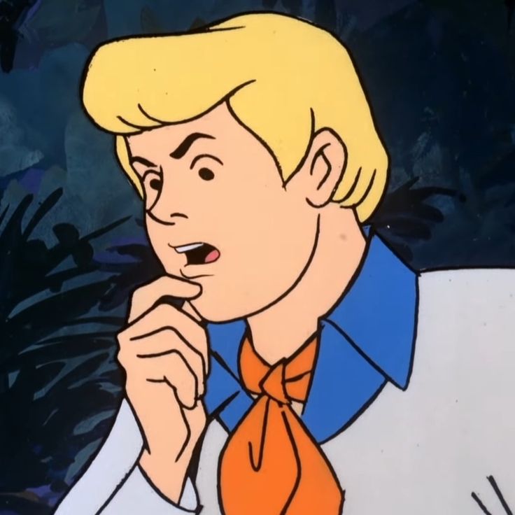 a cartoon man with blonde hair wearing an orange tie and looking at his finger in his mouth